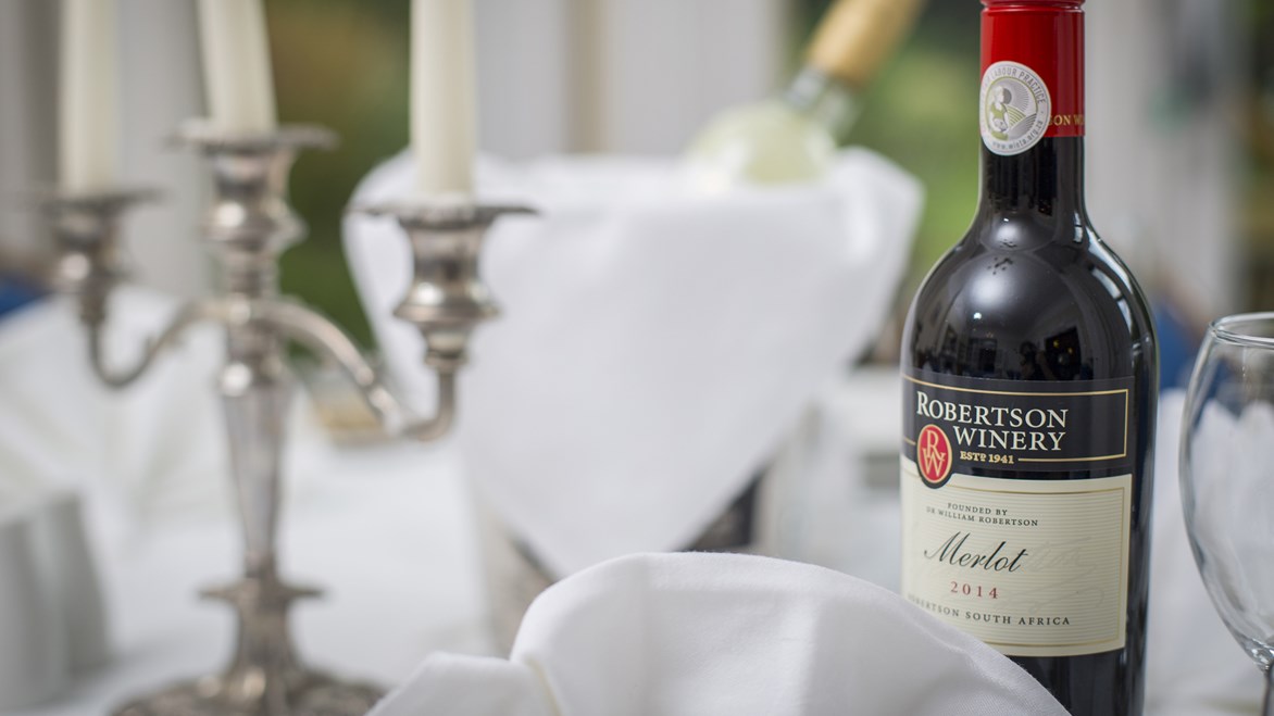 undefinedFormal table with candlestick and wine