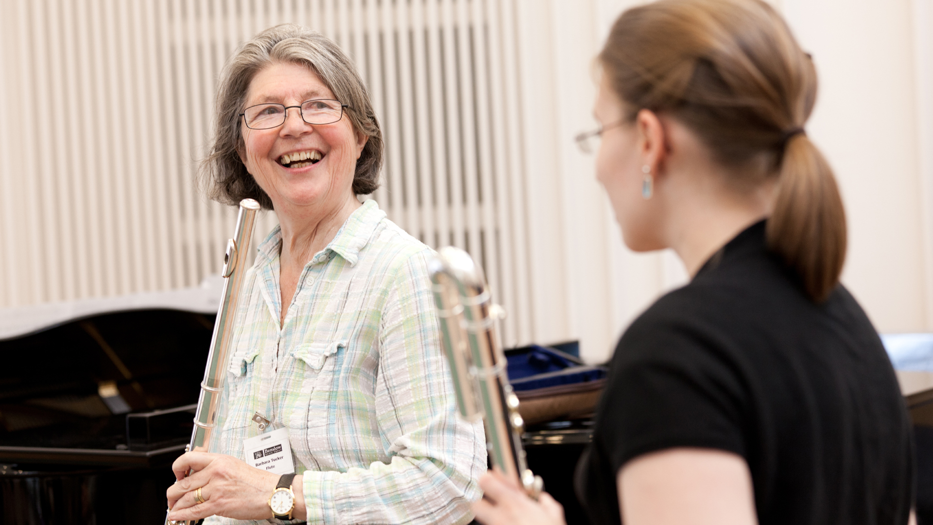 undefinedFlute Player and teacher laughing