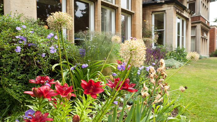 undefinedBenslow main house, garden and flowers view
