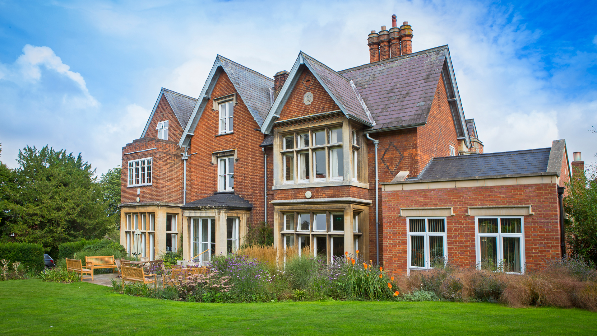 undefinedBenslow Music house and gardens with blue sky